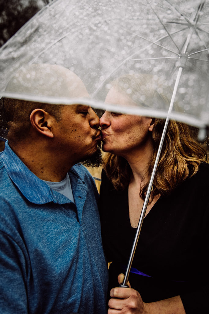 close up kiss in the rain